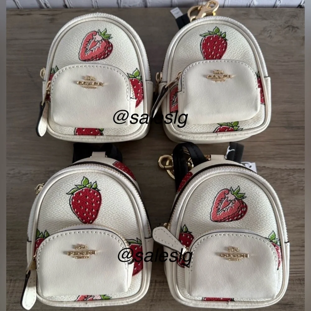It’s a bag charm Coach Charm With Strawberry print CAO93 NWT